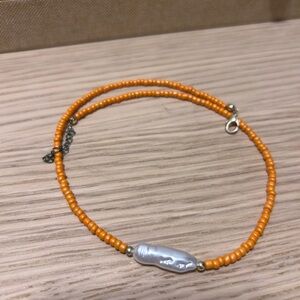 Elegant Orange Beaded Necklace with Silver Accent